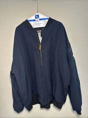Bulwark Protective Apparel Flame Resistant navy blue Jacket with Red Logo